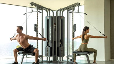 A modern home gym setup featuring a dual adjustable pulley machine.