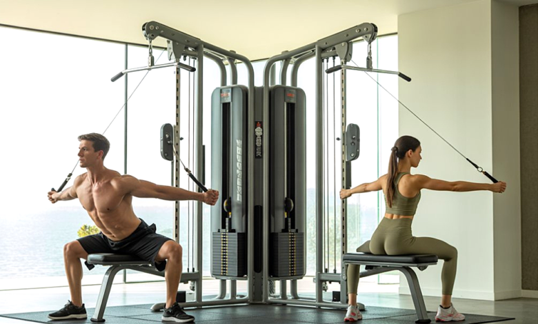 A modern home gym setup featuring a dual adjustable pulley machine.